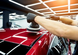 Professional car polishing and paint correction in progress at Spotless Car Spa in Burlington